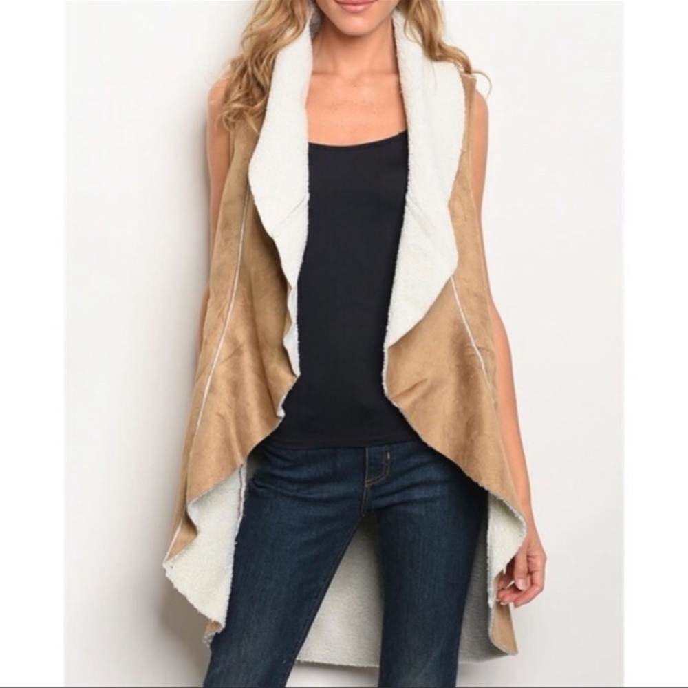 Faux suede and shearling vest, pockets, cascade shearling front.